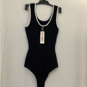 Bodysuit small black white trim never wore